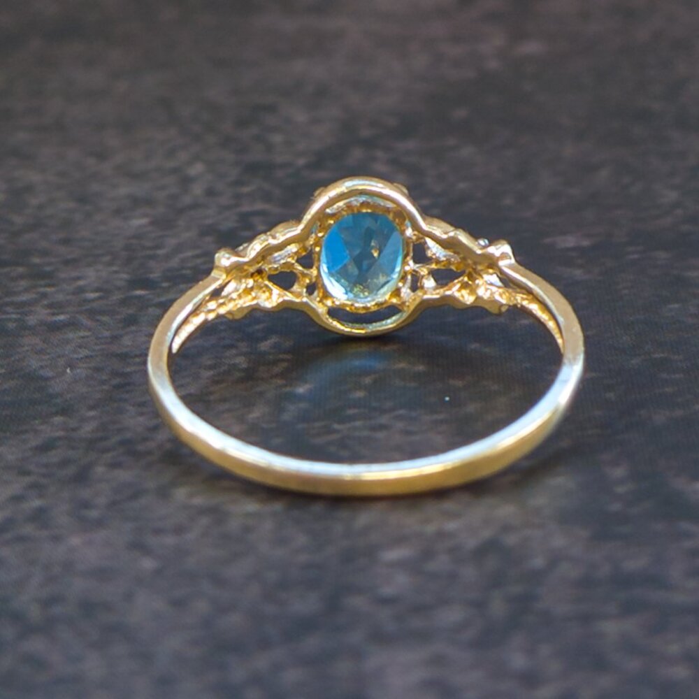 14k Gold Oval Blue Topaz Ring with Diamond Accents - Picture 14 of 15